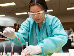 Christina Vo working in a lab