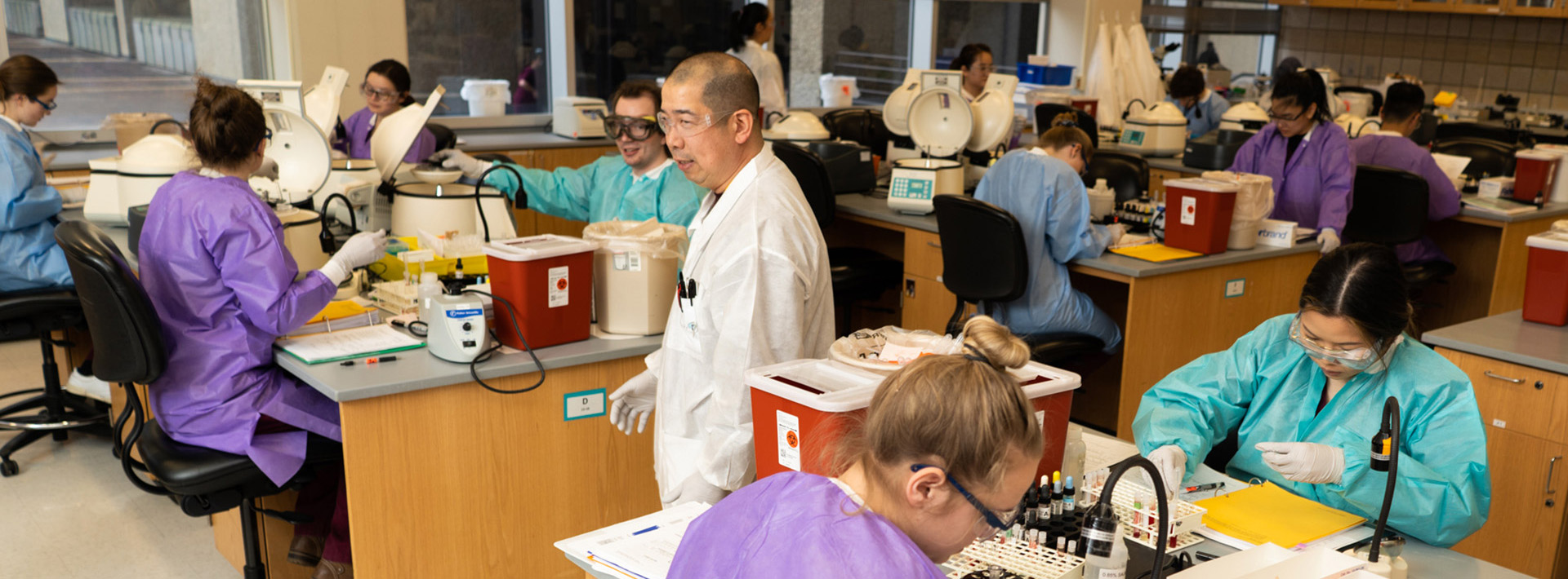 MLS Classroom with Professor and Students working in a lab