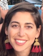 image of lauren's face, dark hair and dark eyes with a smile and beige complexion