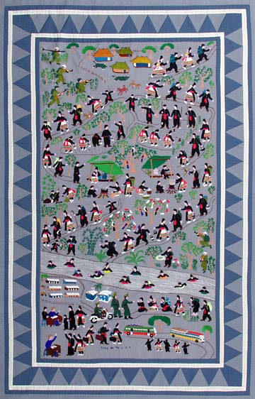 A Hmong quilt called a Paj Ntaub (pronounced pah-dau). Typically each quilt is inscribed with a story sewed into it. This specific quilt portrays the hmong people fleeing and finding refuge.